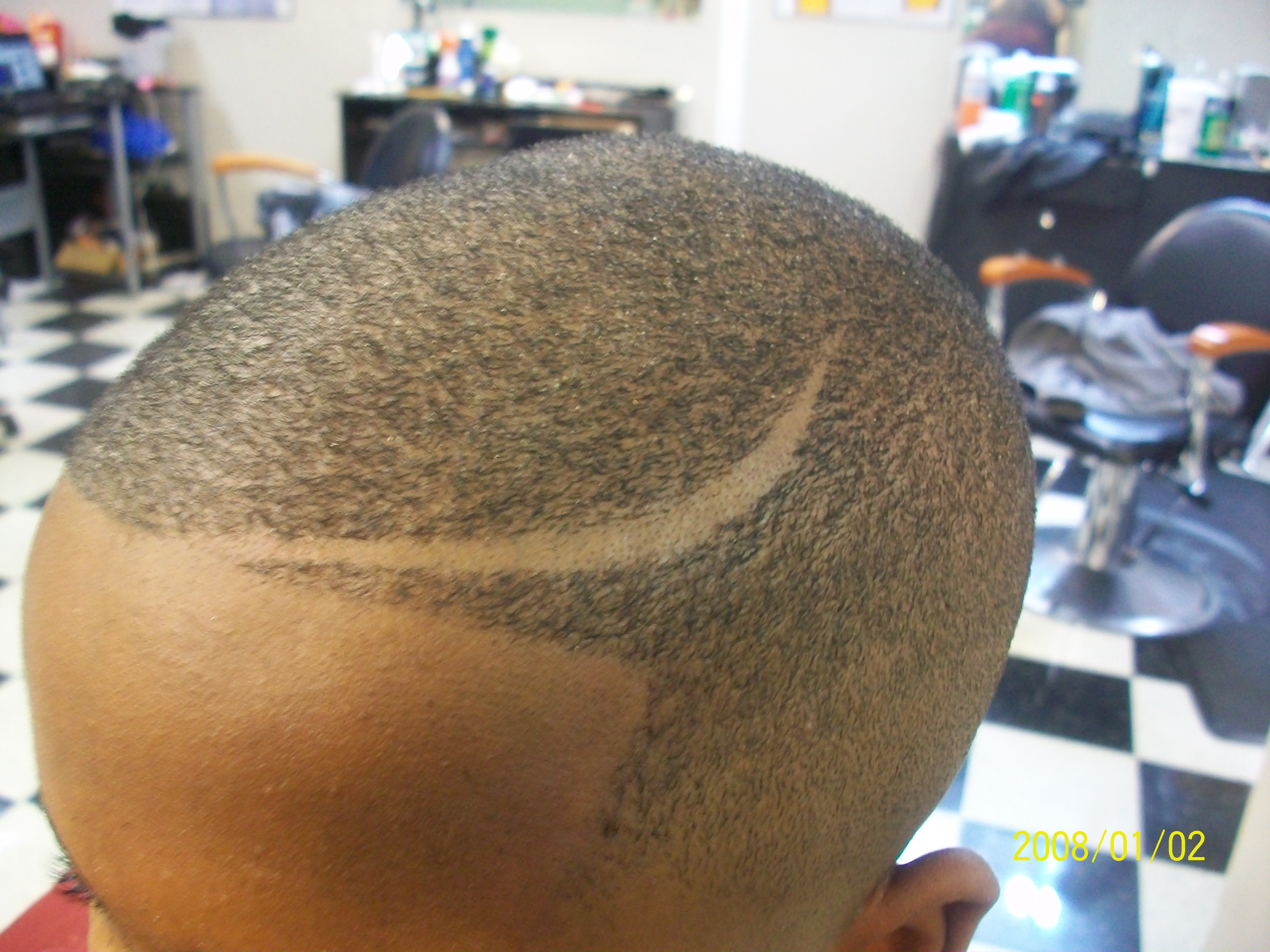 Bald Fade with Clean Part